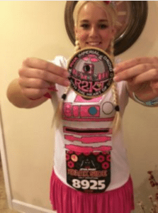 Katie with her R2-KT patch from the 501st!